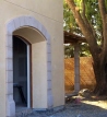 Doorway with arch and reveals